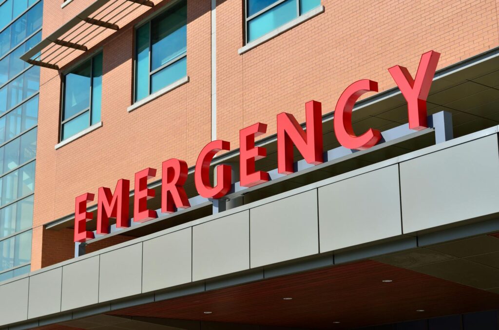 Doctor in trauma center treating car accident injuries